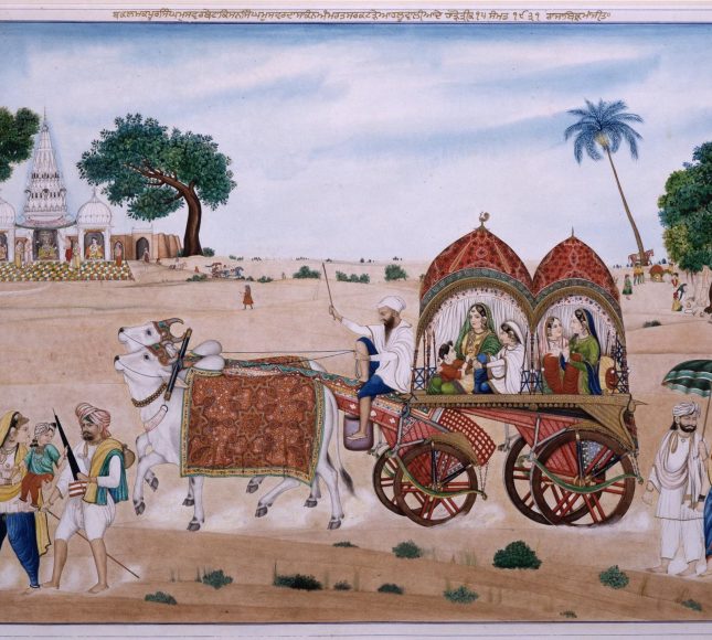 bejewelled sikh ladies in a bullock carriage